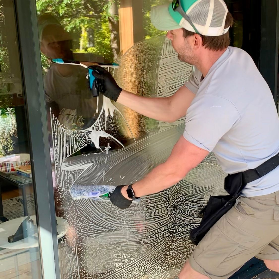 Aquatek Window Cleaning team providing residential window cleaning in Ashford, Surrey.