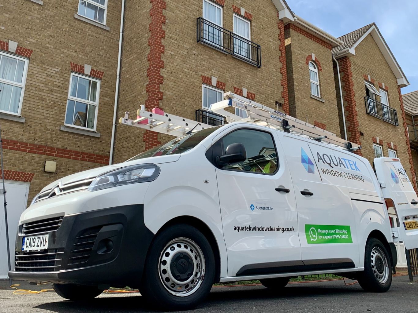 Aquatek Van At A Commercial Window Cleaning Job