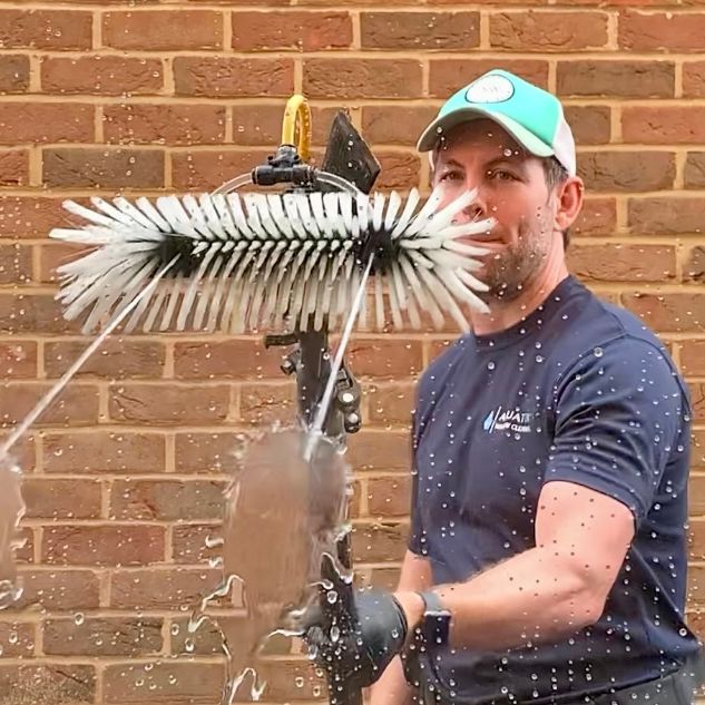 Aquatek Window Cleaning team providing residential window cleaning in Ashford, Surrey.
